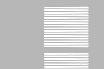 Soft sunlight stripes cast by window blinds create a modern, serene backdrop for your designs.