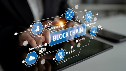 A professional workspace featuring a person using a tablet to showcase blockchain technology with digital icons that represent security, network, cryptography, and tokenization. Tessel