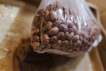 Beans in a bag on the wall
