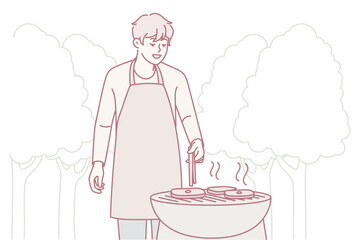 Smiling man in apron making meat on grill in park. Happy guy have fun cooking barbecue outdoors. Weekend and relaxation. Vector illustration.