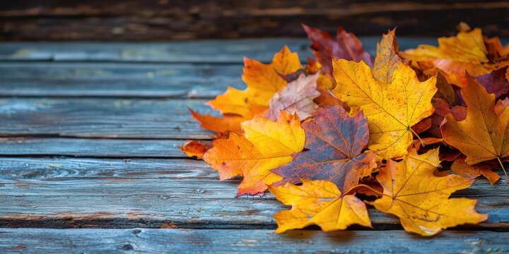 Autumn leaves on a wooden table, with a rustic wooden background. - Powered by Adobe