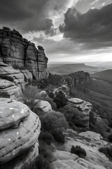 High-contrast black and white image of weathered rock formations, textures and erosion patterns