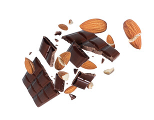Broken dark chocolate bar with whole and crushed almonds in the air on transparent background