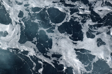 The beach foam in the sea is pure like silk