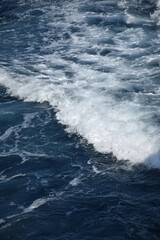 The beach foam in the sea is pure like silk