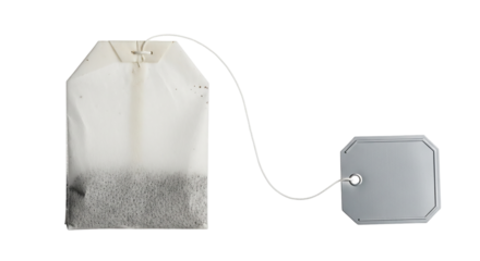 Tea bag with blank label isolated on transparent background ready for hot water