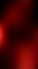 Abstract blurred background with dark and red tones creating a mysterious and dramatic atmosphere for various designs