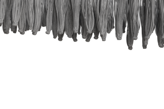 Numerous light gray, textured fibers hang uniformly from the top edge, detailed against a solid black background, resembling a dense, soft fringe or brush bristles