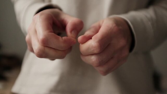 Closeup video of stressed adult woman. Nervously fingers picking. Self harm behaviour. Stress coping psychological mechanism. Mental health issues. Modern society problem. 