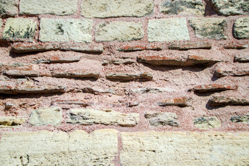 detail of old medieval building  brick stone wall
