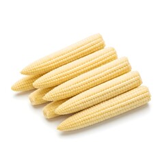 A small pile of fresh young baby corn cobs arranged together isolated on white background