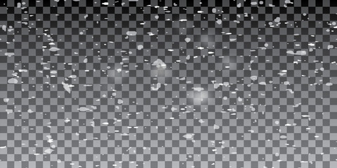 Real snowfall over black background. Abstract snowy white particles falling for winter weather overlay or cold snowfall background. Heavy snow storm.