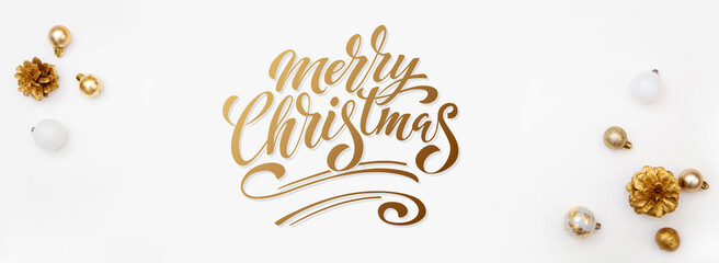 Merry Christmas and Happy New Year greeting card, frame, and banner. Holidays design. Noel and Feliz Navidad. Christmas gifts and decorations, top view. Flat lay.