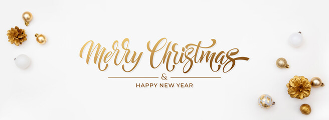 Merry Christmas and Happy New Year greeting card, frame, and banner. Holidays design. Noel and Feliz Navidad. Christmas gifts and decorations, top view. Flat lay.