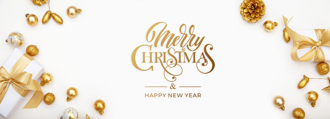 Merry Christmas and Happy New Year greeting card, frame, and banner. Holidays design. Noel and Feliz Navidad. Christmas gifts and decorations, top view. Flat lay.