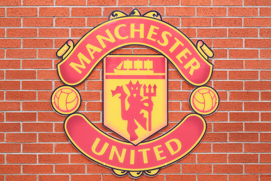 Manchester United badge on a wall at Old Trafford football stadium. September 29, 2025. Manchester, England, United Kingdom