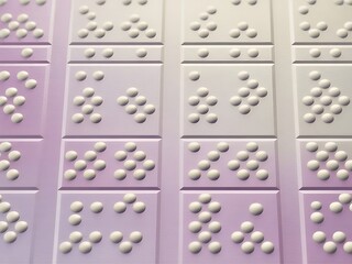 Closeup of braille tiles with raised dots for visually impaired individuals