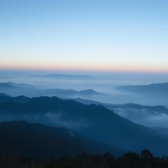 Obraz premium Misty mountain range at dawn, layers of blue peaks fading into a soft sky.