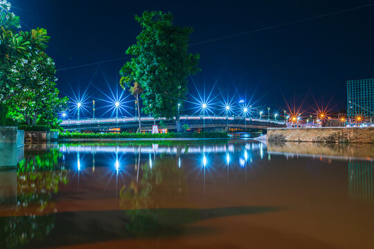 The color of Night traffic light on the road on the bridge (Eka Thot Sa Root Bridge) in Phitsanulok, Thailand.