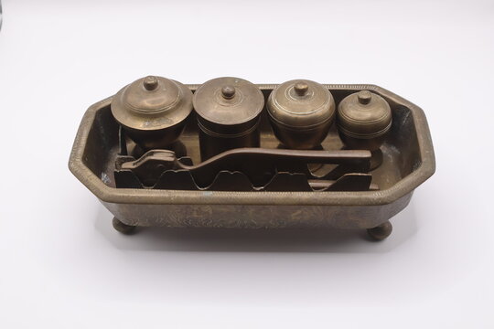 The image of traditional brass "Tepak sirih" also known as a betel nut container which is an integral part of malay ceremonial practices particularly in Malaysia, Indonesia and Brunei.