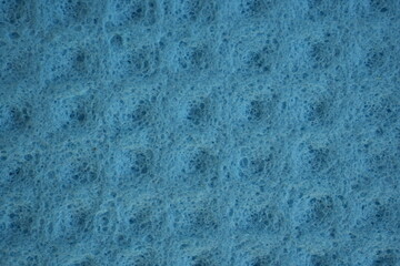 blue sponge texture close up, pink abstract sponge texture as background photo on top	
