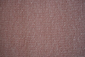 pink Soft plush fabric texture, close-up macro view of soft plush fabric with a warm, fuzzy surface. The detailed texture shows dense fibers and a gentle, velvety feel commonly used in blankets, cloth