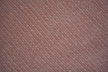 pink Soft plush fabric texture, close-up macro view of soft plush fabric with a warm, fuzzy surface. The detailed texture shows dense fibers and a gentle, velvety feel commonly used in blankets, cloth © Анна Климчук