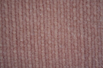 pink Soft plush fabric texture, close-up macro view of soft plush fabric with a warm, fuzzy surface. The detailed texture shows dense fibers and a gentle, velvety feel commonly used in blankets, cloth © Анна Климчук