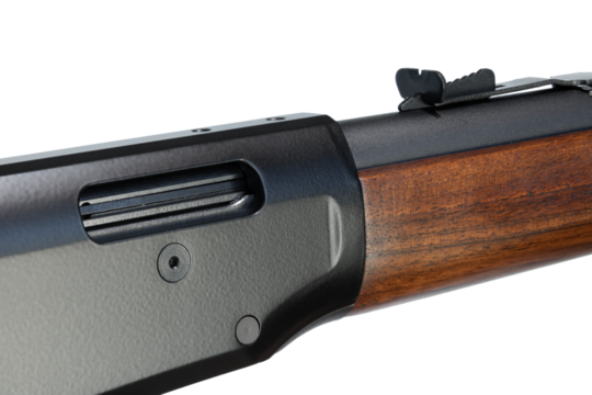 Rear sight and ejection port on a wood stocked lever action rifle
