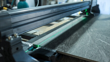 Precise tile cutting with a laser guide for accurate measurements and clean edges