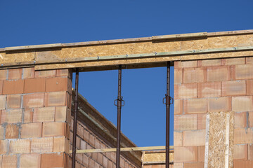 Wooden and steel formwork prepared for concrete pouring on a building project