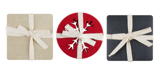 Bright red round coaster with a snowflake pattern cut out in the center cut out isolated transparent background