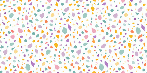 Pastel terrazzo seamless pattern with colorful irregular shapes on white background