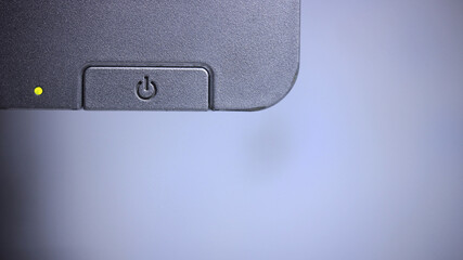Power button on device with indicator light — on off control and technology detail