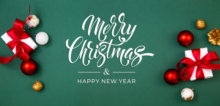 Merry Christmas and Happy New Year greeting card, frame, and banner. Holidays design. Noel and Feliz Navidad. Christmas gifts and decorations, top view. Flat lay. - Powered by Adobe