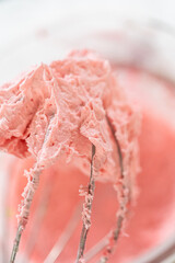 Pink Raspberry Buttercream on Whisk Closeup