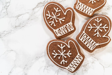 Beautifully Decorated Mitten Cookies with Royal Icing Designs