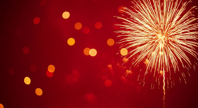 A dazzling firework display against a deep red sky, perfect for festive celebrations and special events