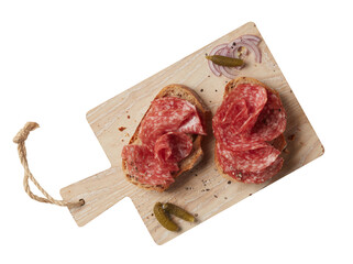 Salami sandwich on a wooden plate with handles cut out isolated transparent background