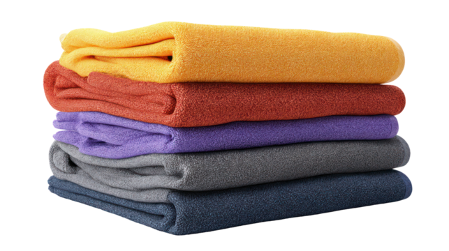 Stack of folded colorful towels isolated on transparent background