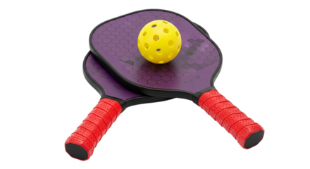 Two purple pickleball paddles with red handles and a yellow pickleball on top, isolated on a transparent background