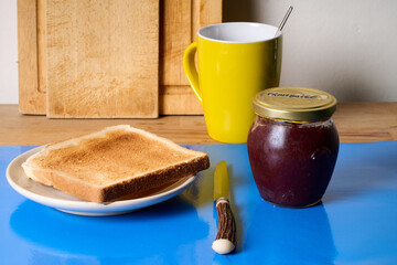 Toasted bread and raspberry jam
