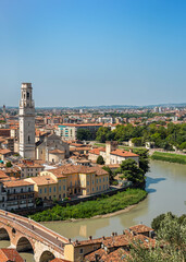 Scenic view of Verona, Italy, with the prominent Ponte Pietra (Stone Bridge) crossing the Adige River. 
