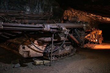 Fototapeta premium Old drilling jumbo in underground mine