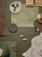 Green and earthy mood board featuring wood, stone, dried plants, and natural fabrics. A...