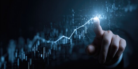 Hand points to a rising graph, overlayed with financial data