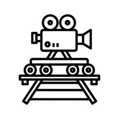 Fototapeta premium Vintage movie camera on a dolly with tracks, isolated on