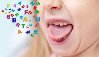 Child showing tongue, girl sticking out tongue, letter, gymnastics tongue, speech therapy, pronunciation practice session, practicing sounds, language development, speech delay, dental tongue exercise