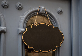 vintage wooden plaque on the old door