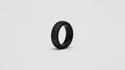 Black onyx gothic inspired gemstone band ring stylishly shown on plain white background